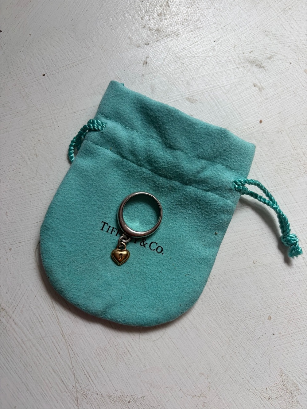 Tiffany & Co. Turquoise Pouch with Silver Ring and Gold Heart Charm